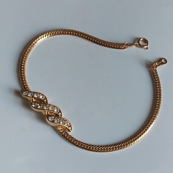 Avon Jewelry - SOLD Vintage Avon Sparkle Twist Rhinestone Embellished Gold Tone Bracelet